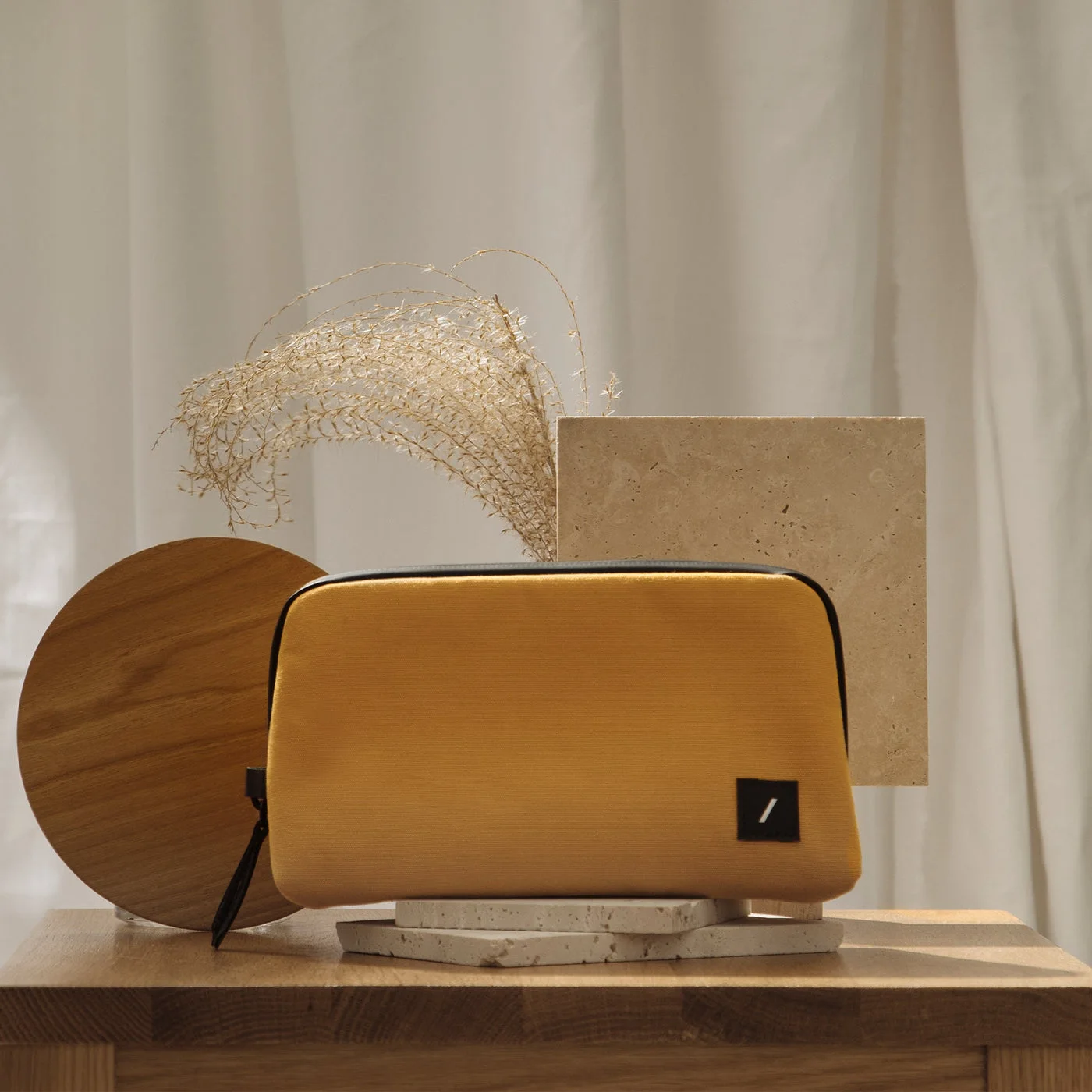 Kraft organizer styling scene; matching laptop sleeve is a separate product.