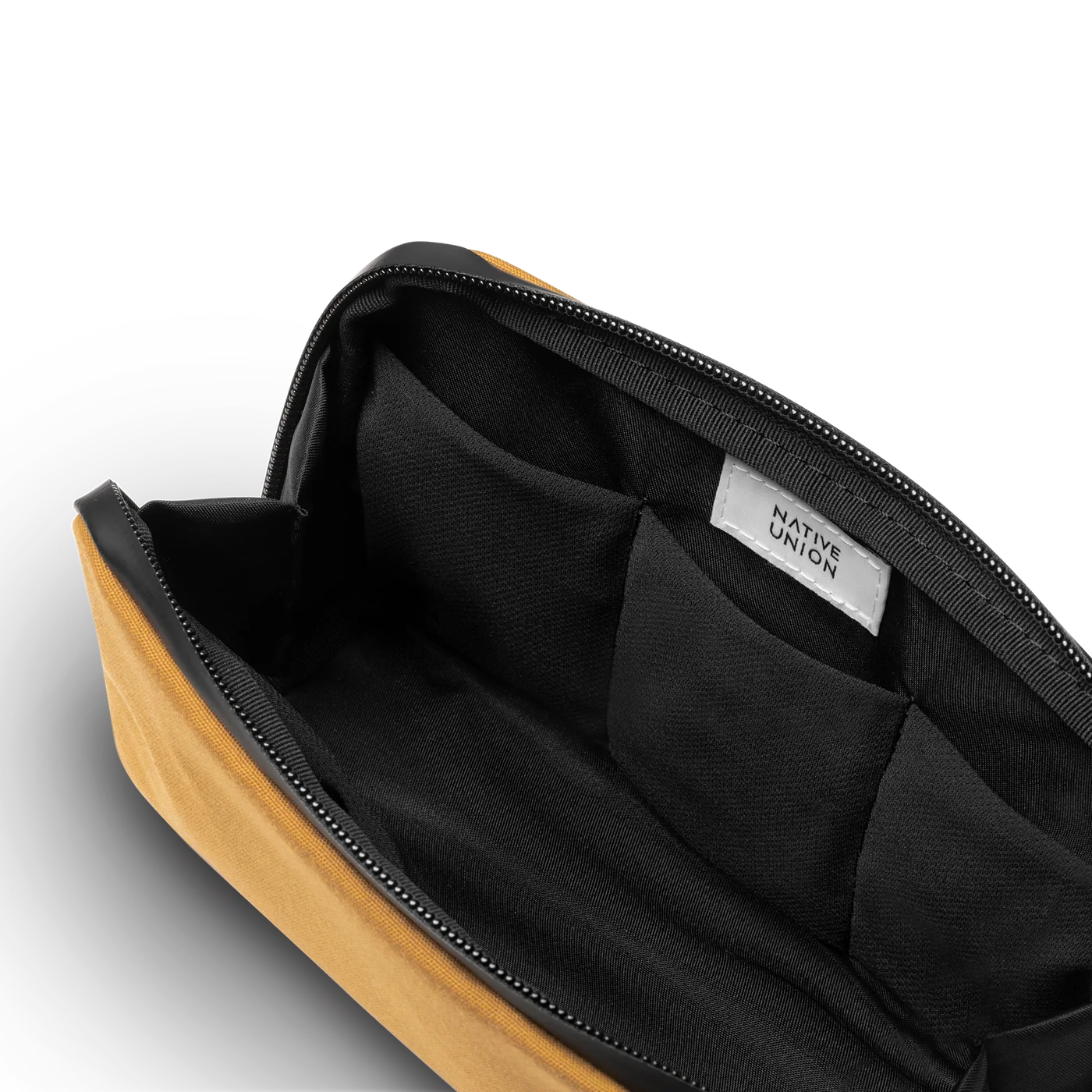 Empty Kraft interior illustrates the flexible pocket layout.