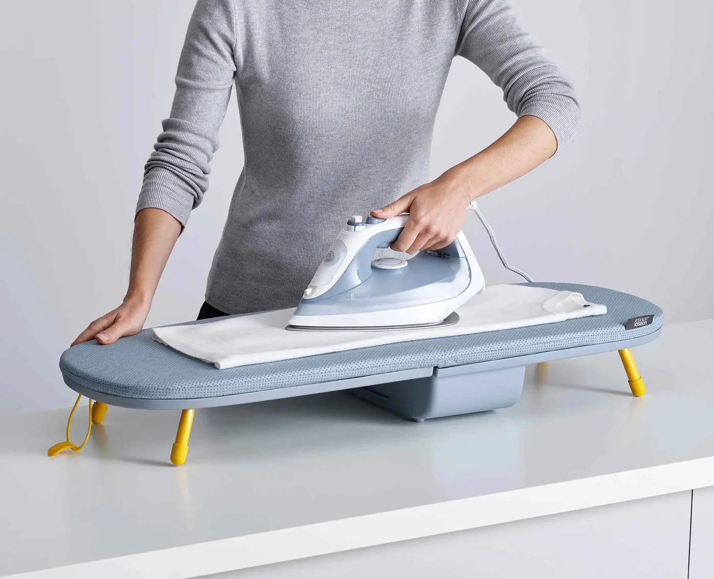 Original Gray 50009 Pocket board in use on a tabletop; the iron is not included.