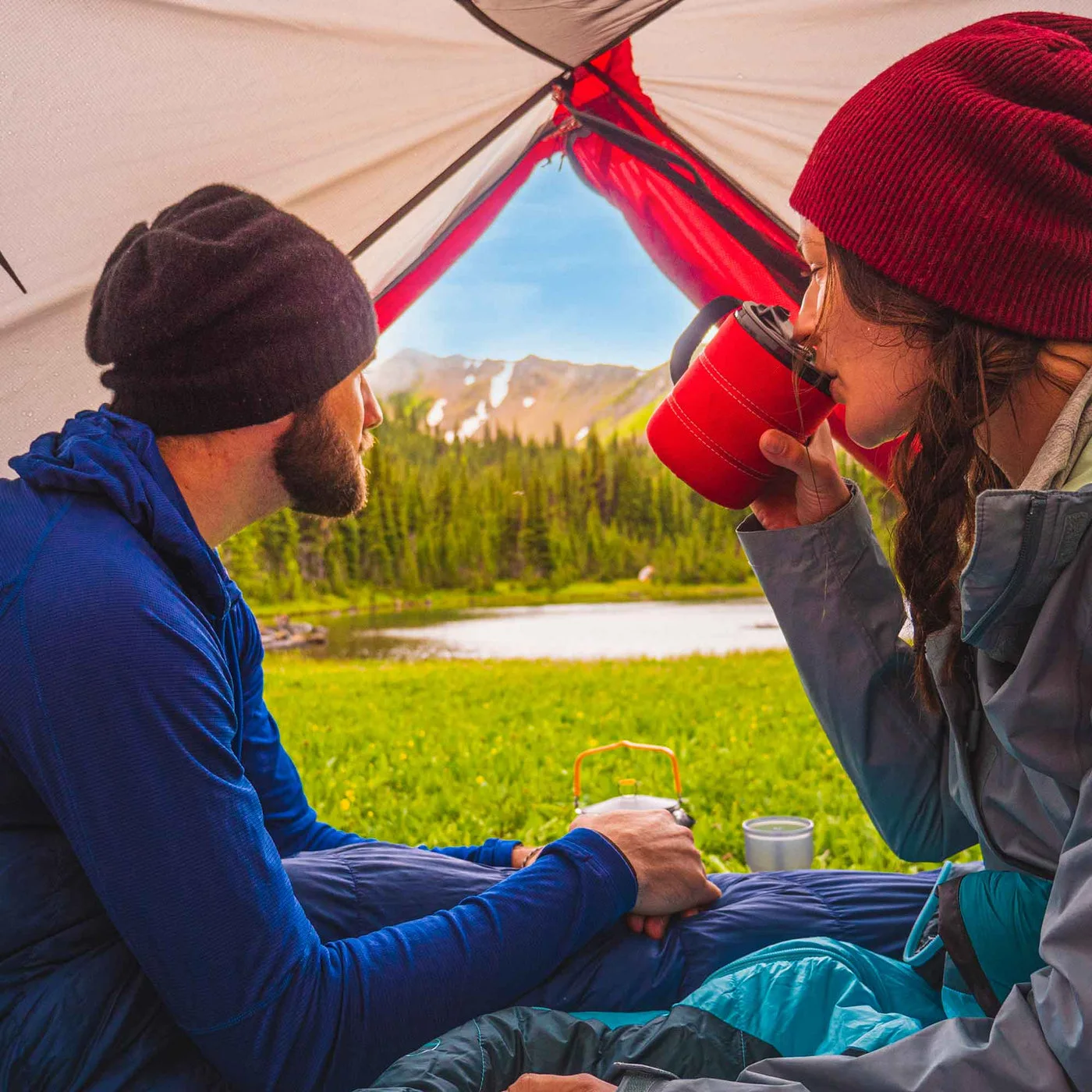 Maker campsite reference of two people using the mug series; not a Findweave field test.
