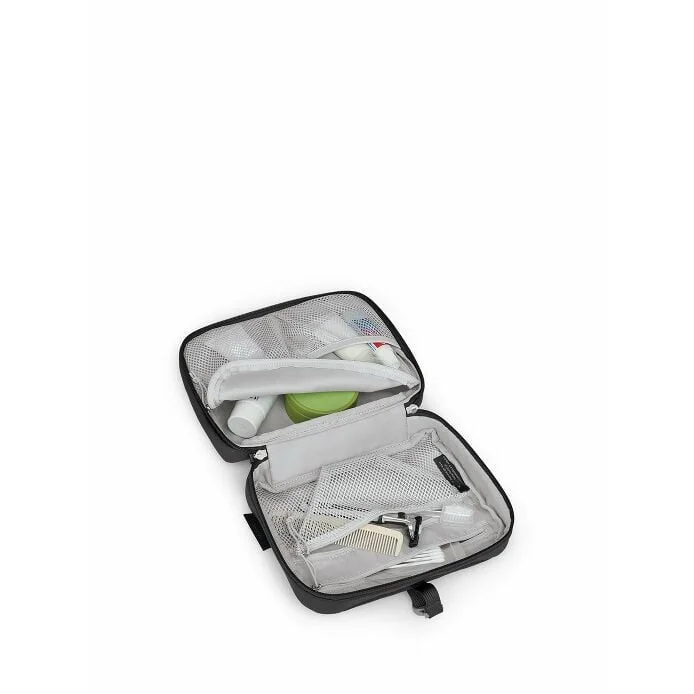 The open kit shows its divided packing arrangement; displayed toiletries are not included.
