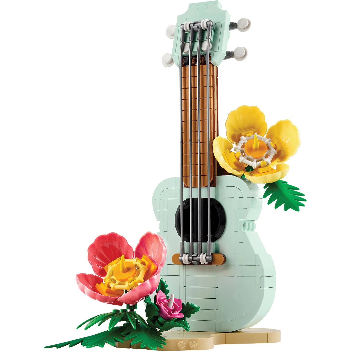 Completed 31156 ukulele model with flowers and beach display stand; not a working instrument.