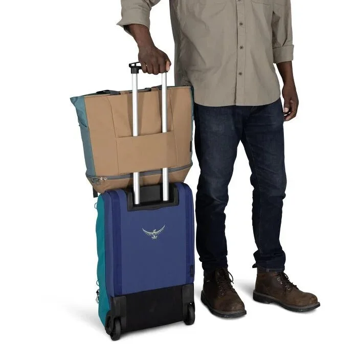 Selected Large Tote Pack secured over rolling luggage using the rear sleeve; luggage is not included.
