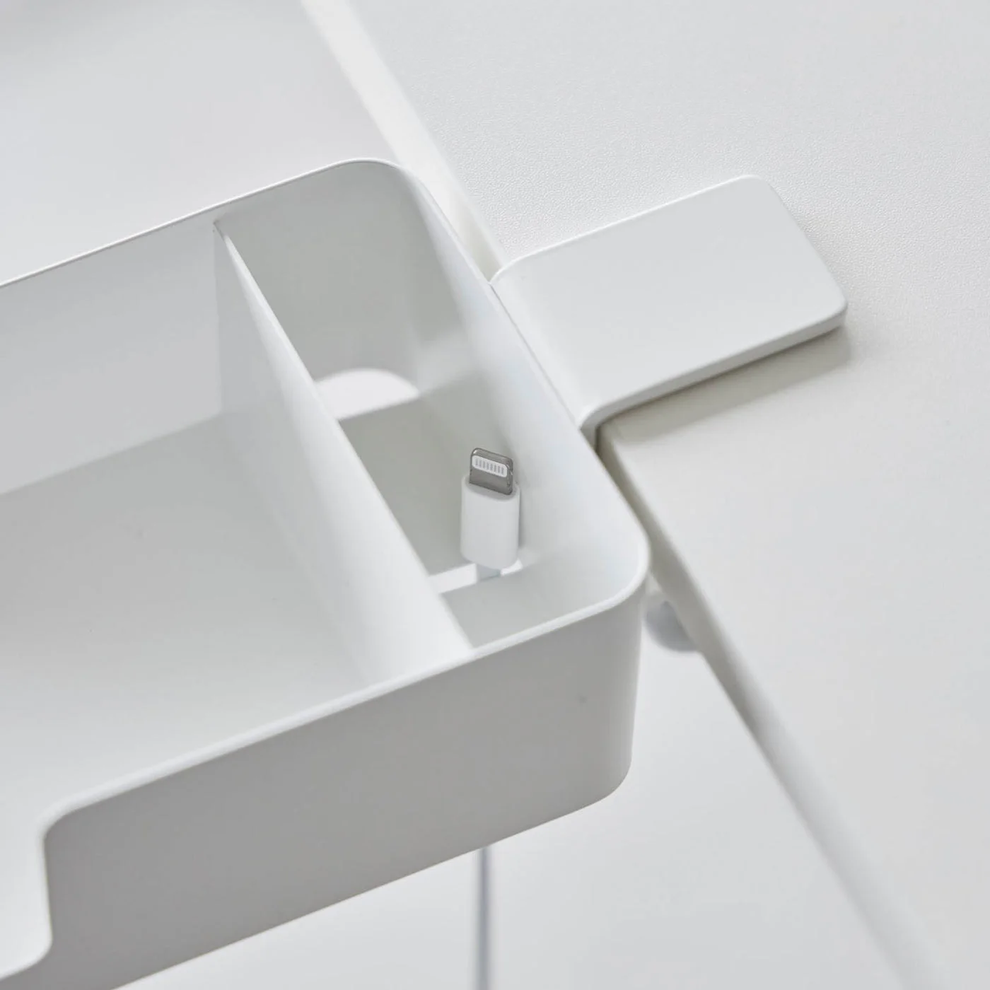 White colour alternative viewed from above to illustrate the divided compartments and cable opening.