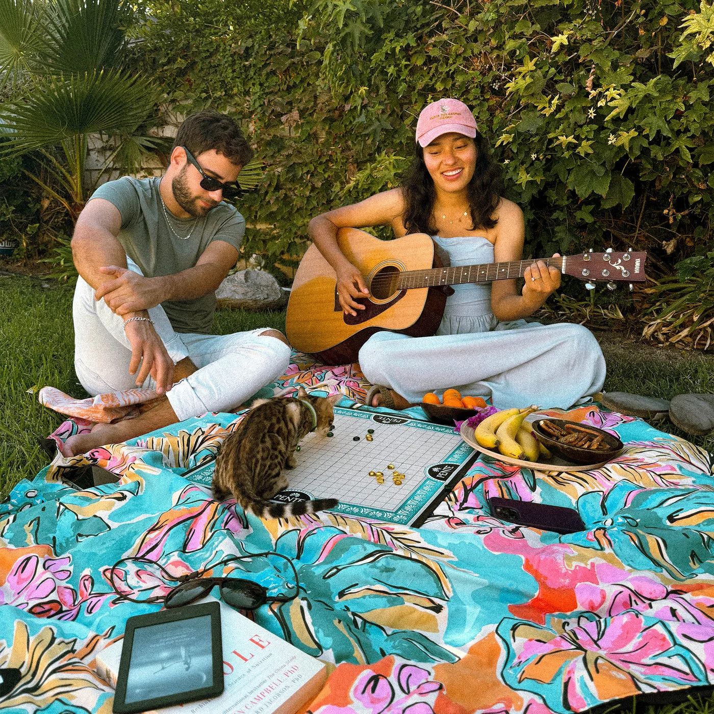 Manufacturer outdoor gathering scene; instruments, food and other props are not supplied.