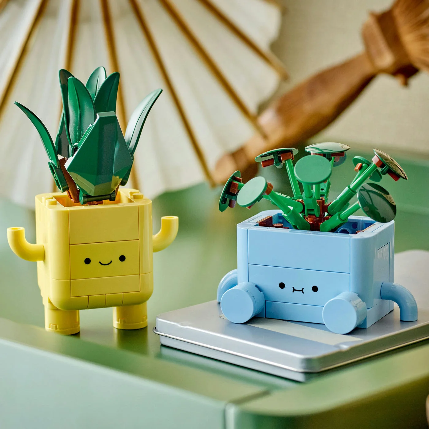 Happy Plants displayed on a shelf; surrounding items not included