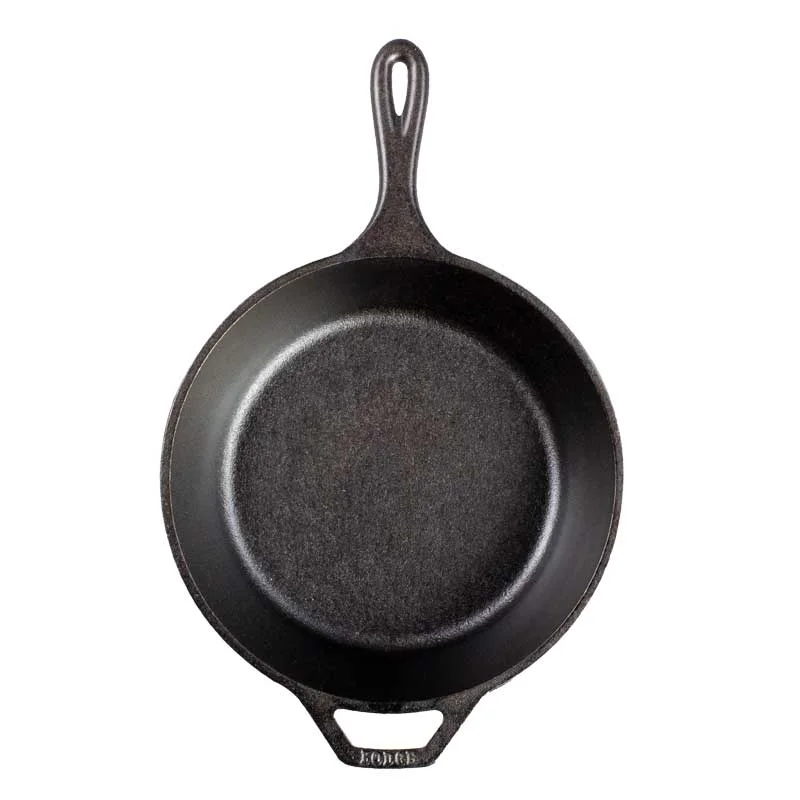 Top view of the shallow cooking surface; this is seasoned iron, not enamel.