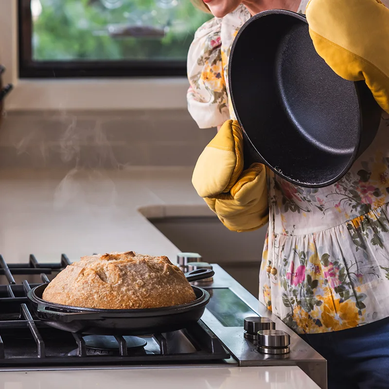 Manufacturer bread scene illustrates using the shallow half as a base; suitable heat protection is essential.