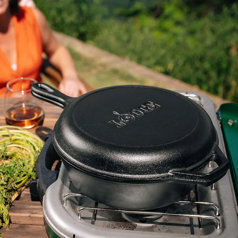 Manufacturer outdoor scene shows the nested cooker; the portable burner is a prop, not supplied cookware.