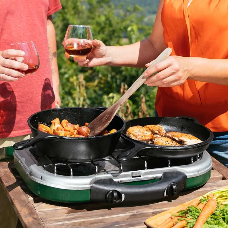 Manufacturer scene illustrates the two pans in separate use; no personal cooking test is claimed.
