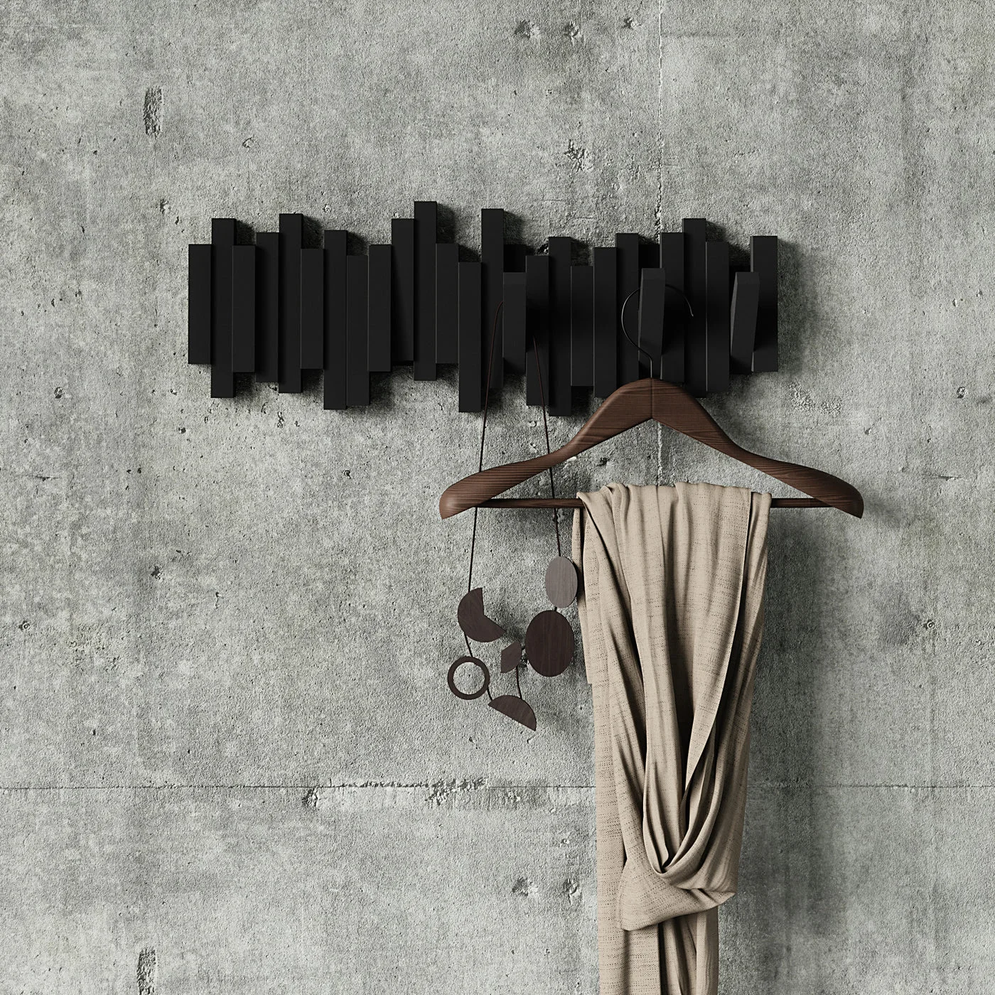 Closer manufacturer view with coat and bag, showing the clearance needed below deployed hooks.
