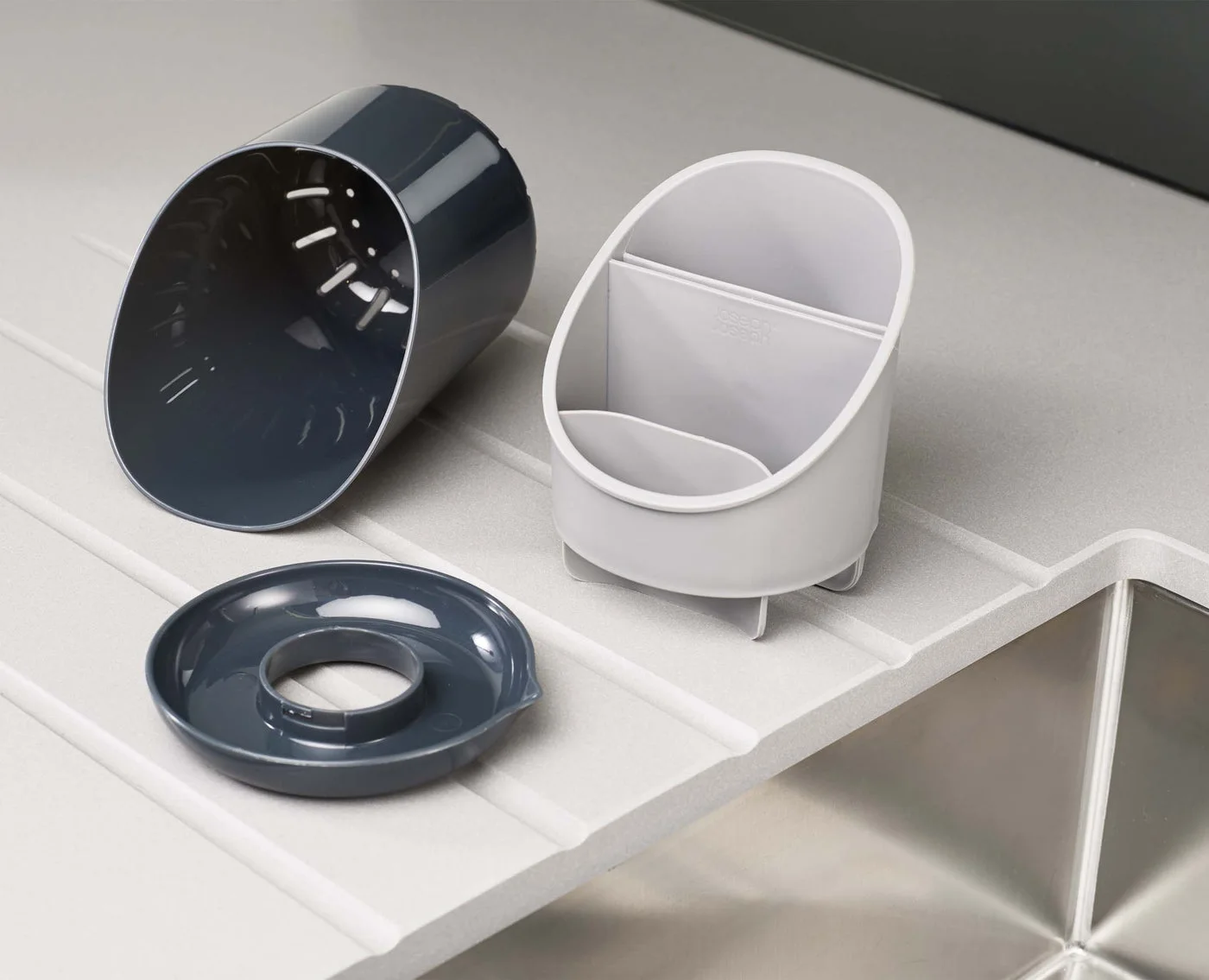 Separated shell, insert and saucer show access for cleaning; not three separate included drainers.