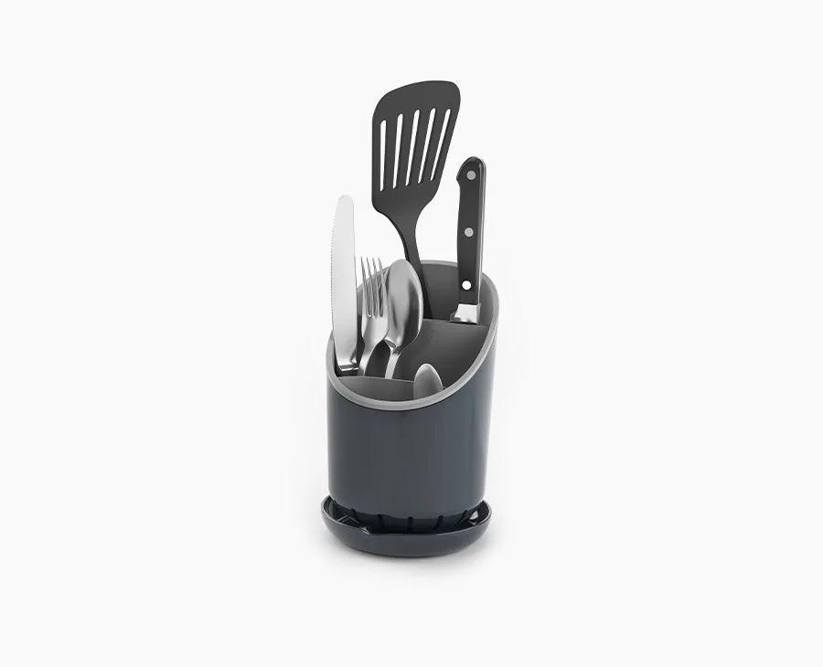 GreyDock85075 shown holding cutlery and utensils as display props.