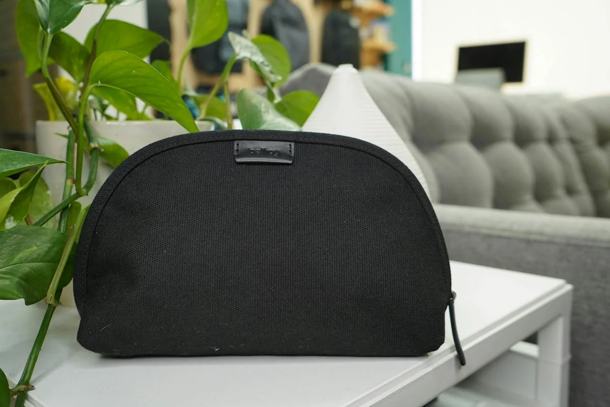 Black Classic Pouch on a table in a Pack Hacker reference photograph.