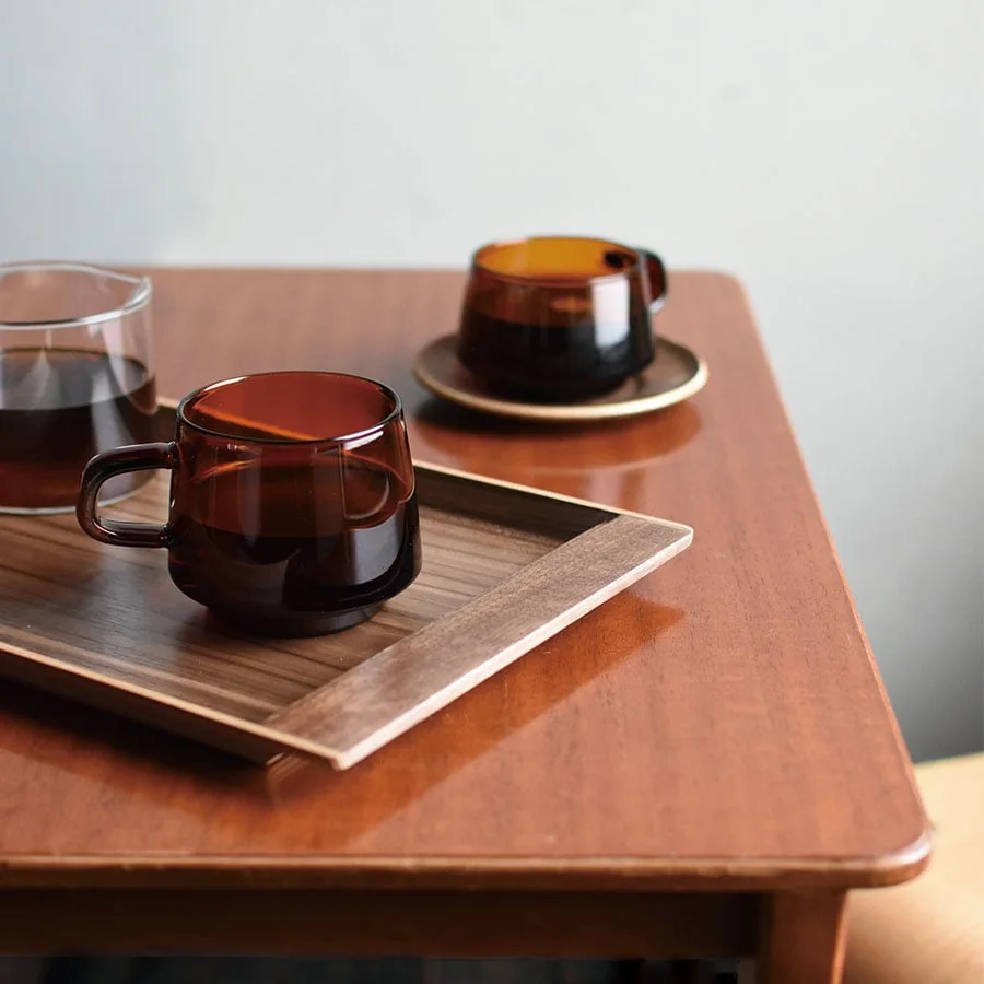 Sepia mugs styled on a tray; the tray, saucers and other vessels are not part of this mug offer.