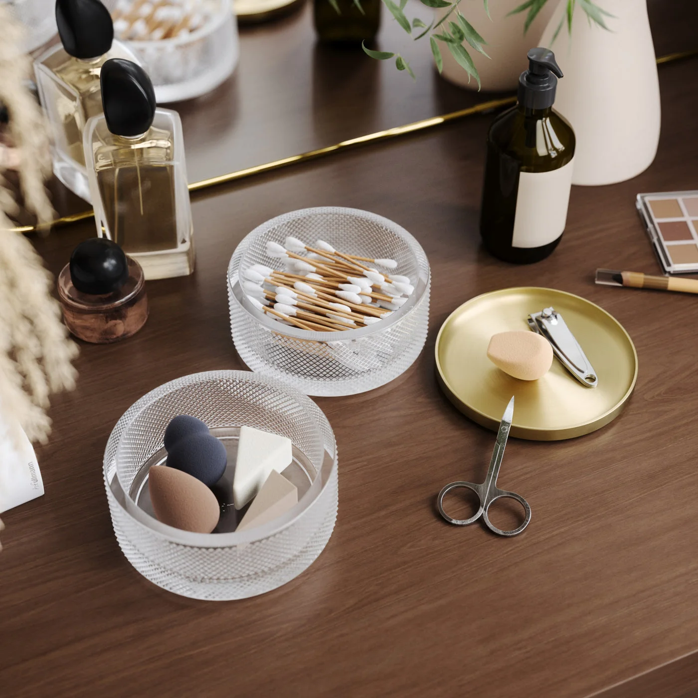 Separated compartments on a styled vanity illustrate everyday access.