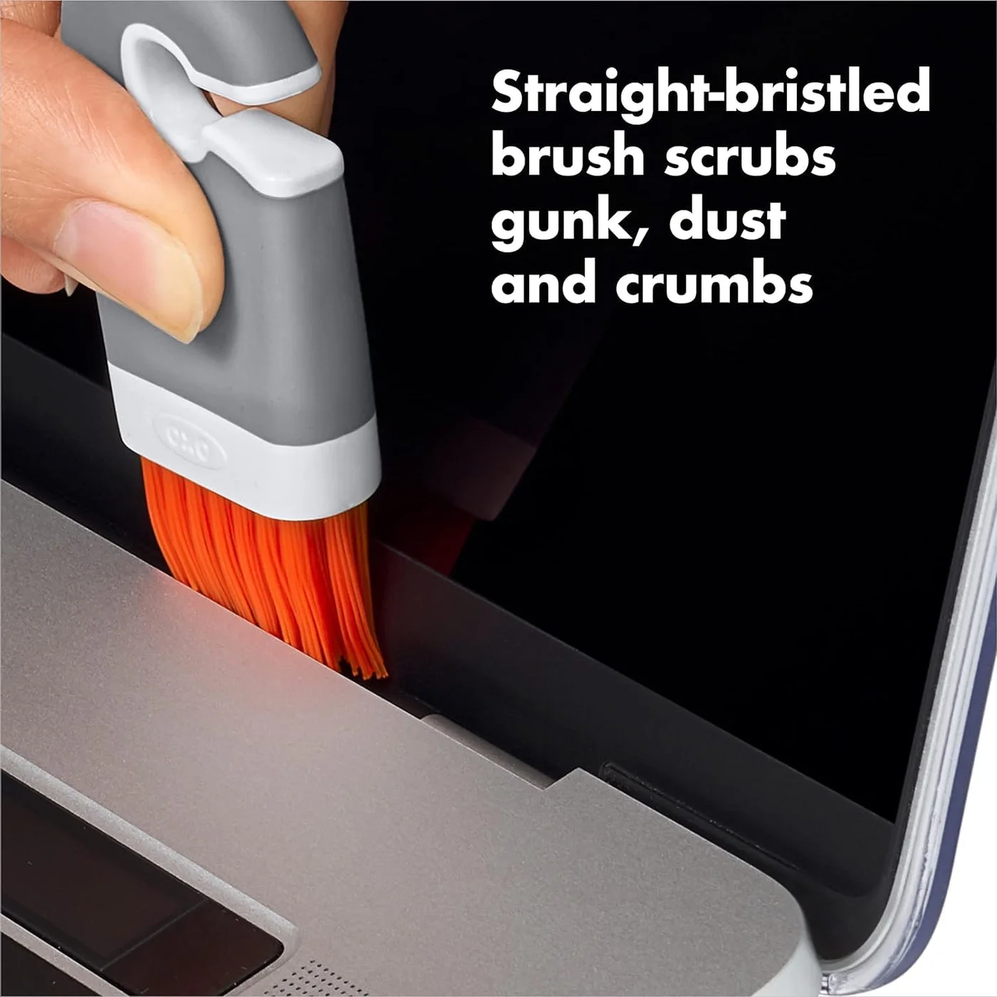 Straight-bristle brush illustrated at an accessible keyboard edge.