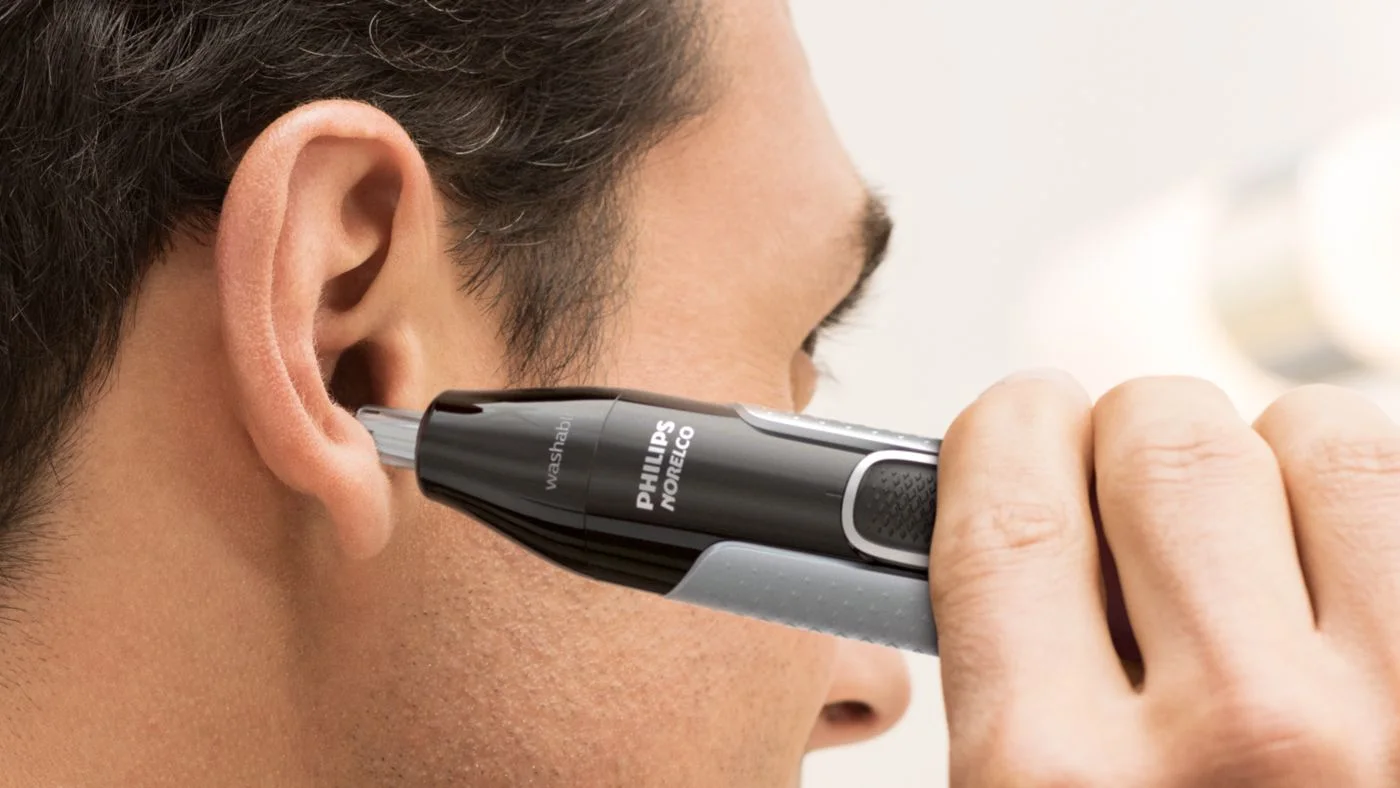 Manufacturer ear-area use illustration, not personalized grooming advice.