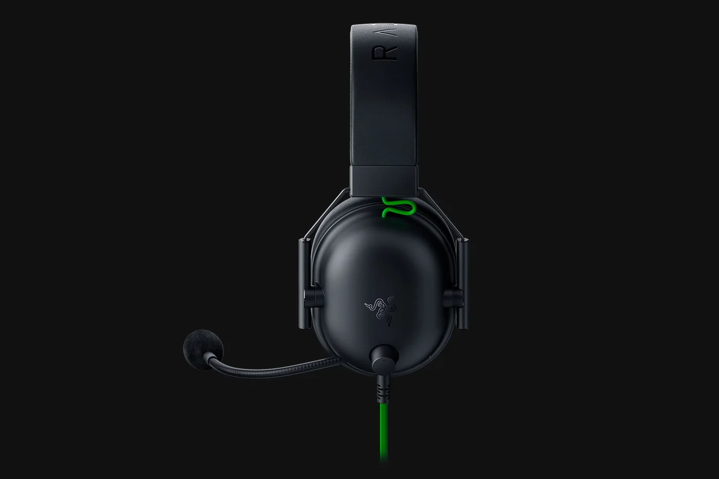 Side view shows the closed earcup and attached microphone arrangement.