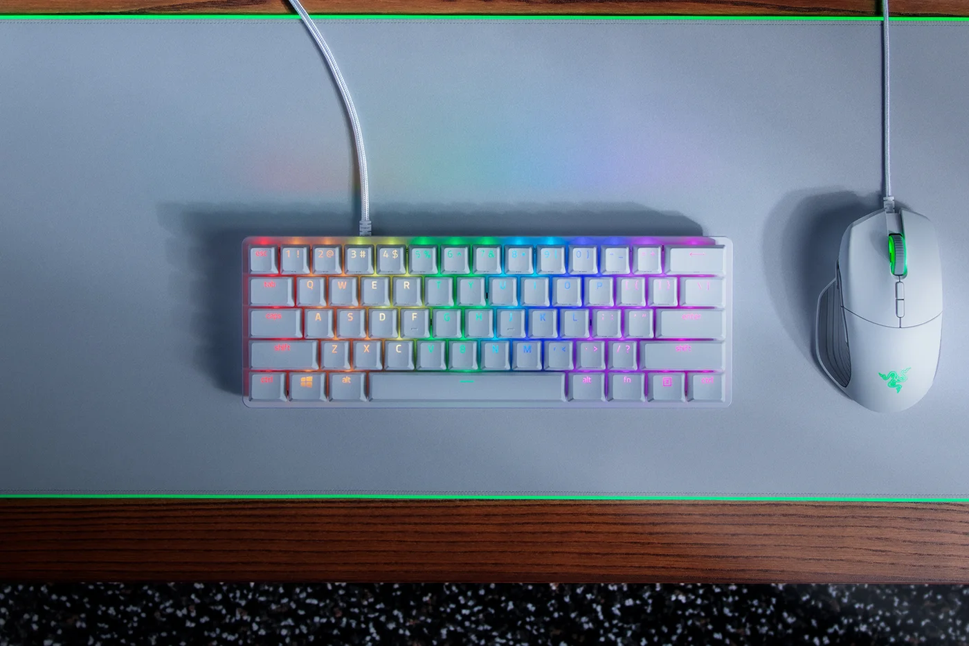 White Mercury Huntsman Mini in a compact desk setup; the mouse is sold separately.