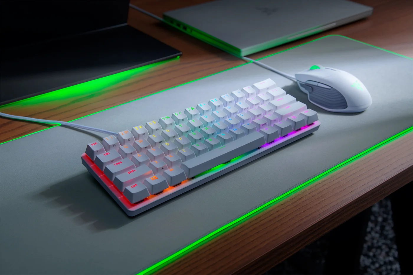Angled view of the white 60% keyboard and detachable cable.