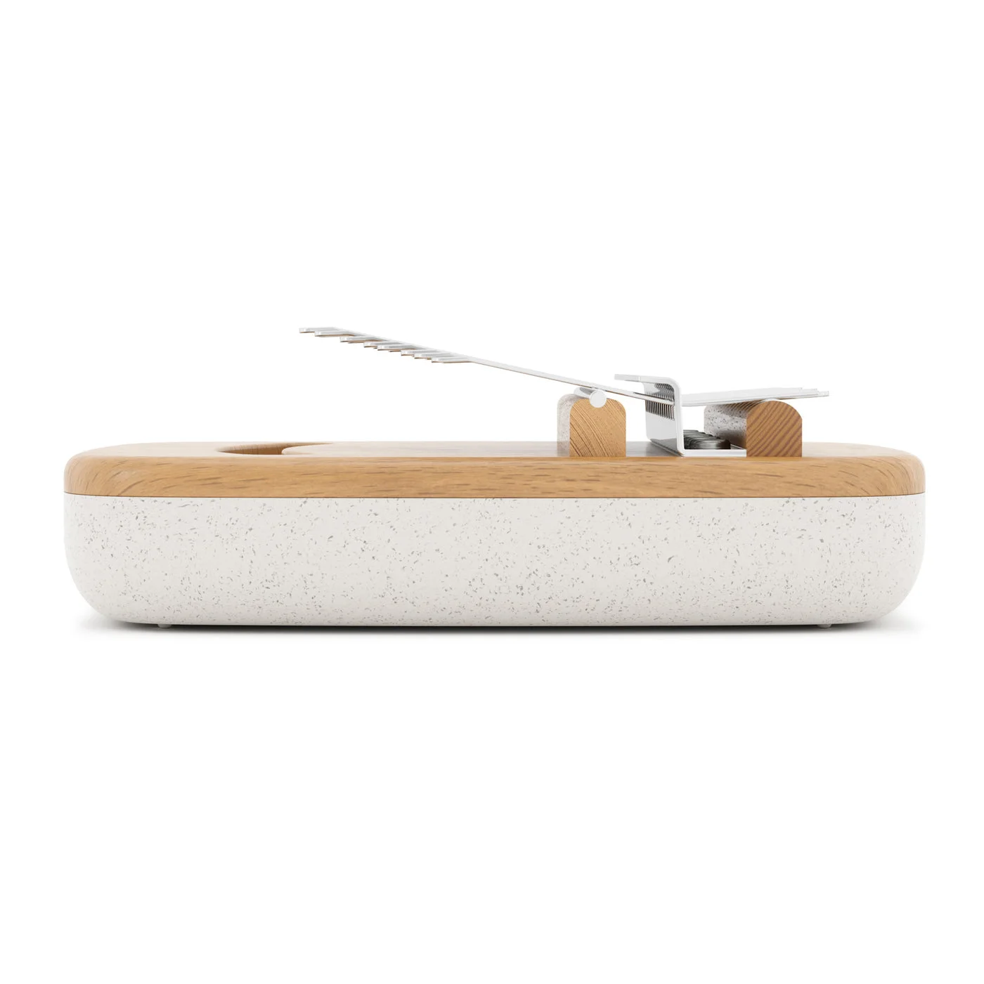 The side profile shows how the keys rise above the rounded body.