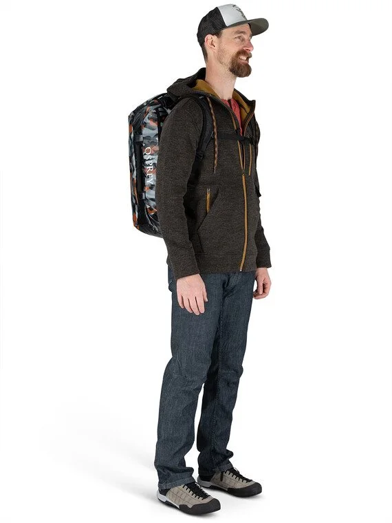 Alternate Black Orange Camo model illustrates backpack carry; selected listing is Black.