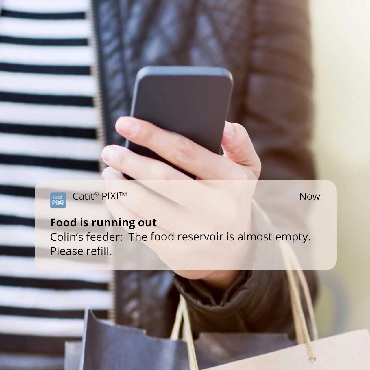 Low-food notification example prompting a physical reservoir check.
