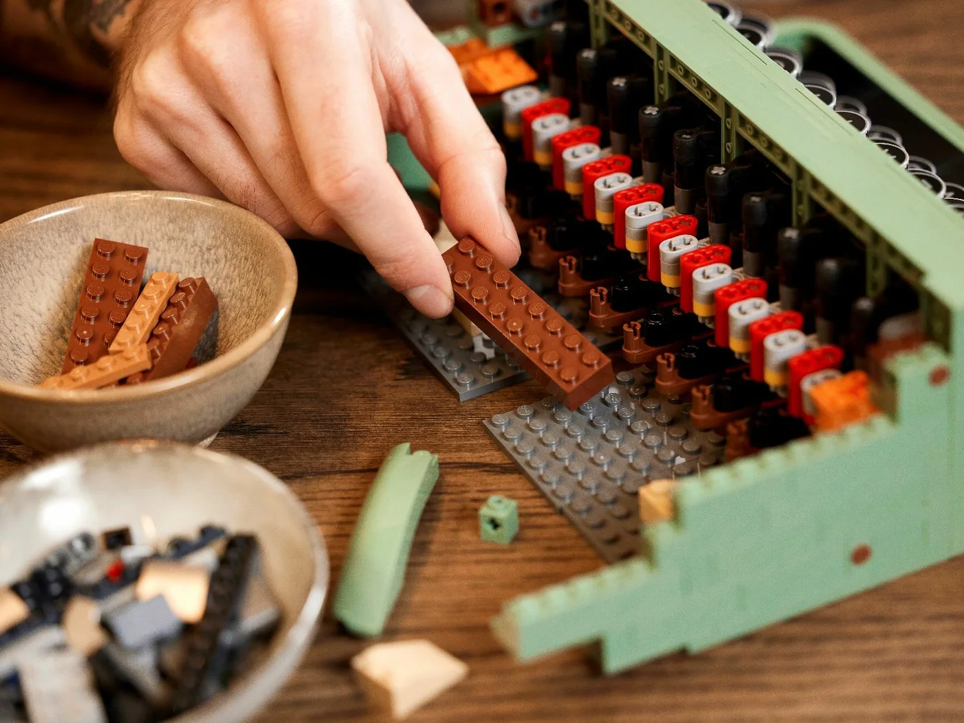 Connecting the internal colored mechanical components.