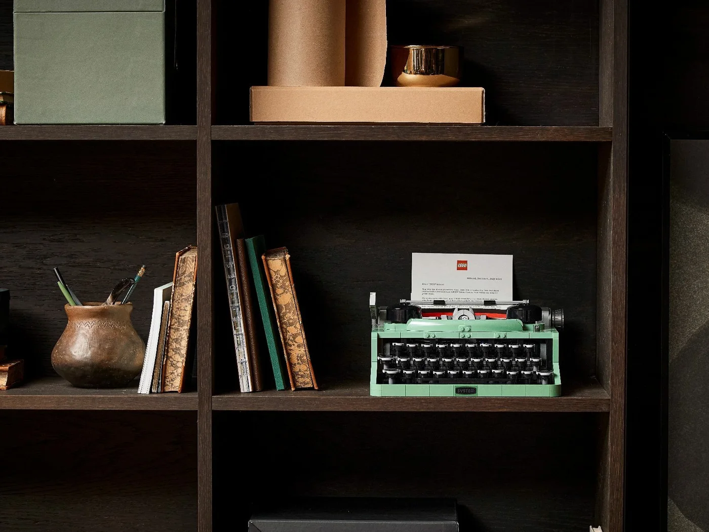 Completed typewriter on a shelf; allow the required depth and clearance.