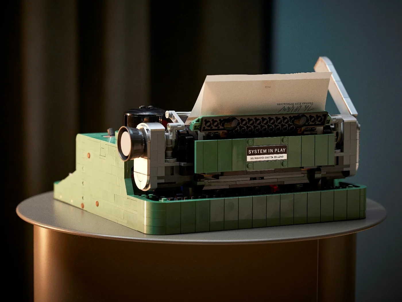 Rear of the completed typewriter with paper in place.