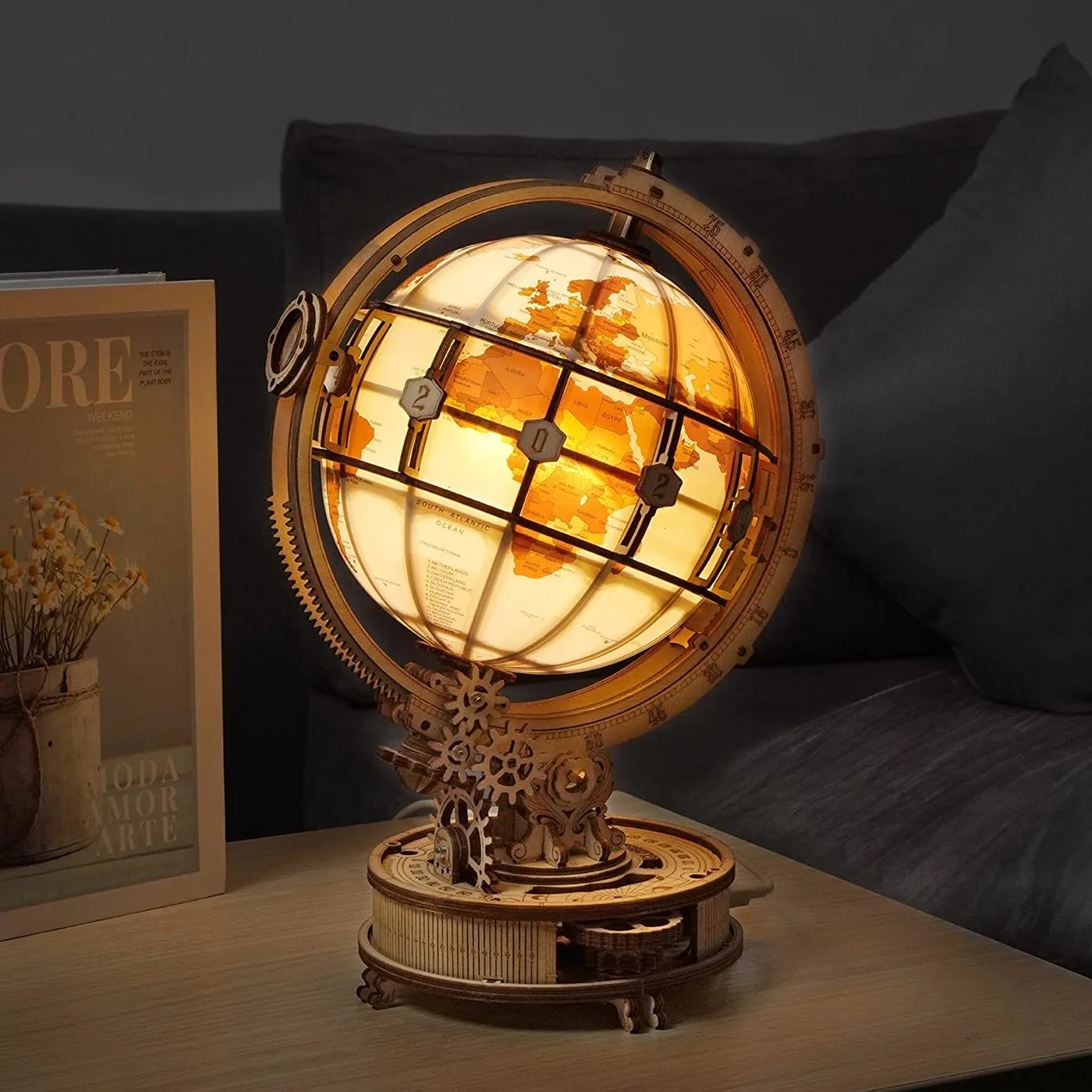 ST003 globe illuminated in a maker-staged dark-room scene