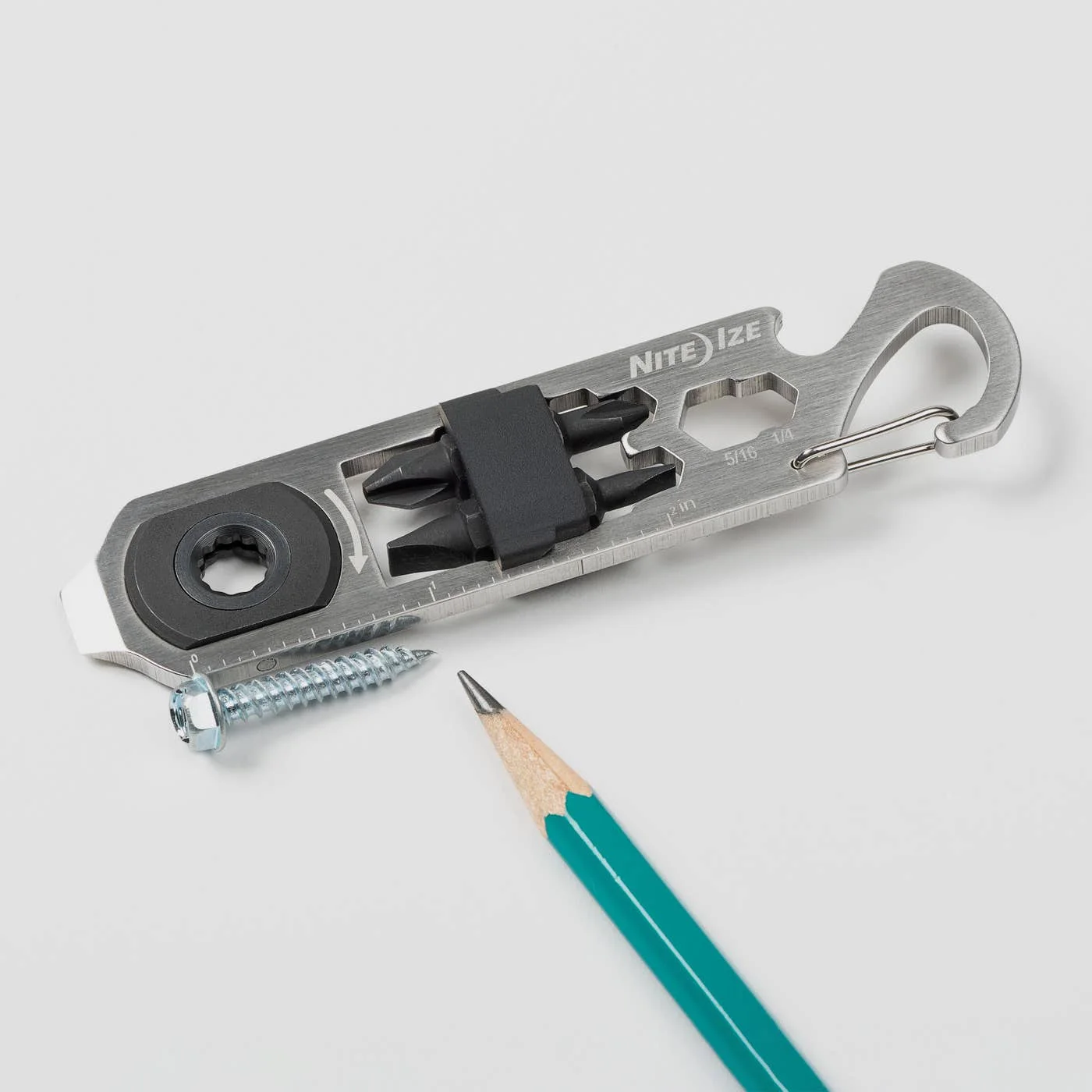 A loose double-ended bit beside the body; pencil illustrates the scene and is not included.