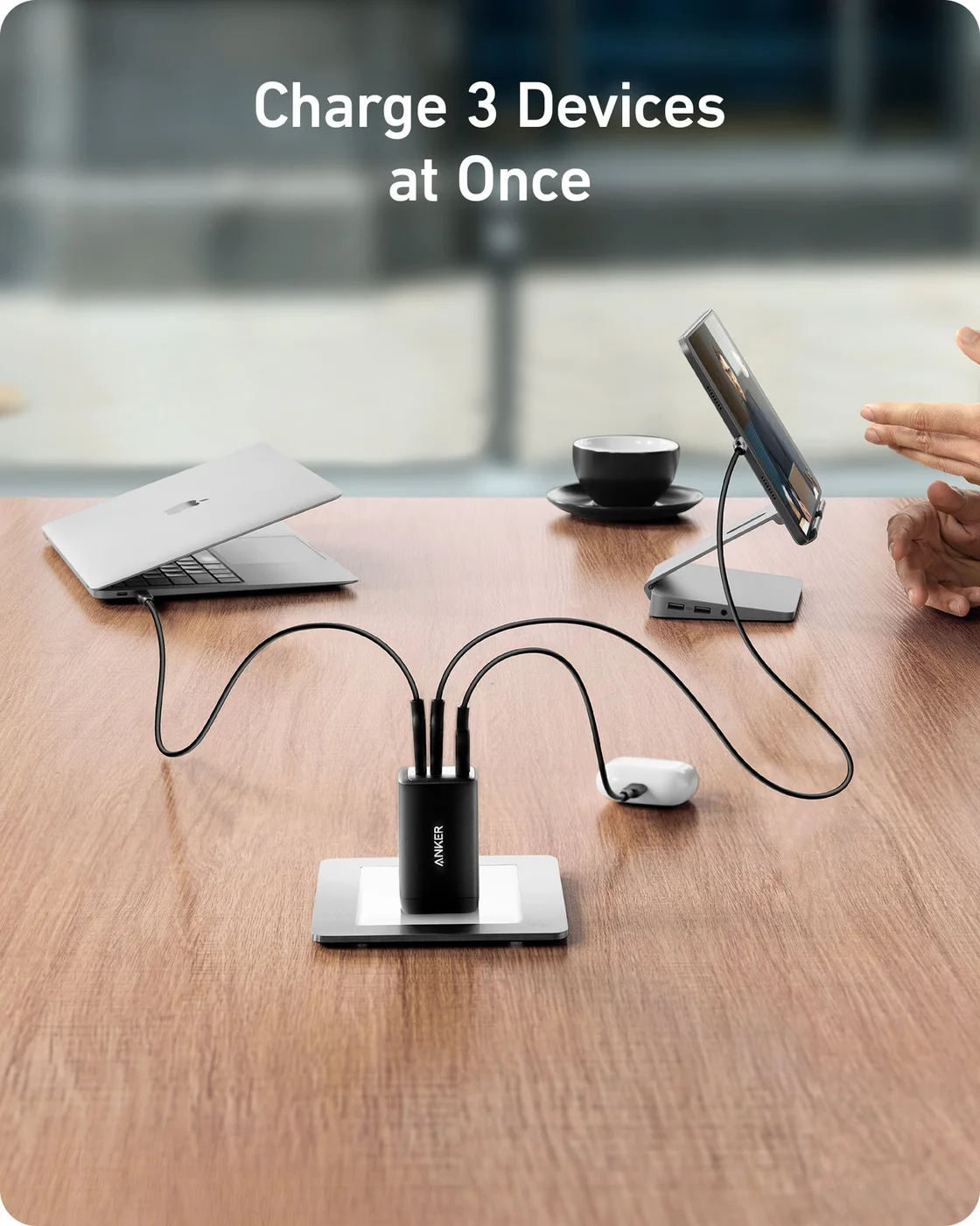 Three connected devices demonstrate the shared-port arrangement; cables and devices are not included.