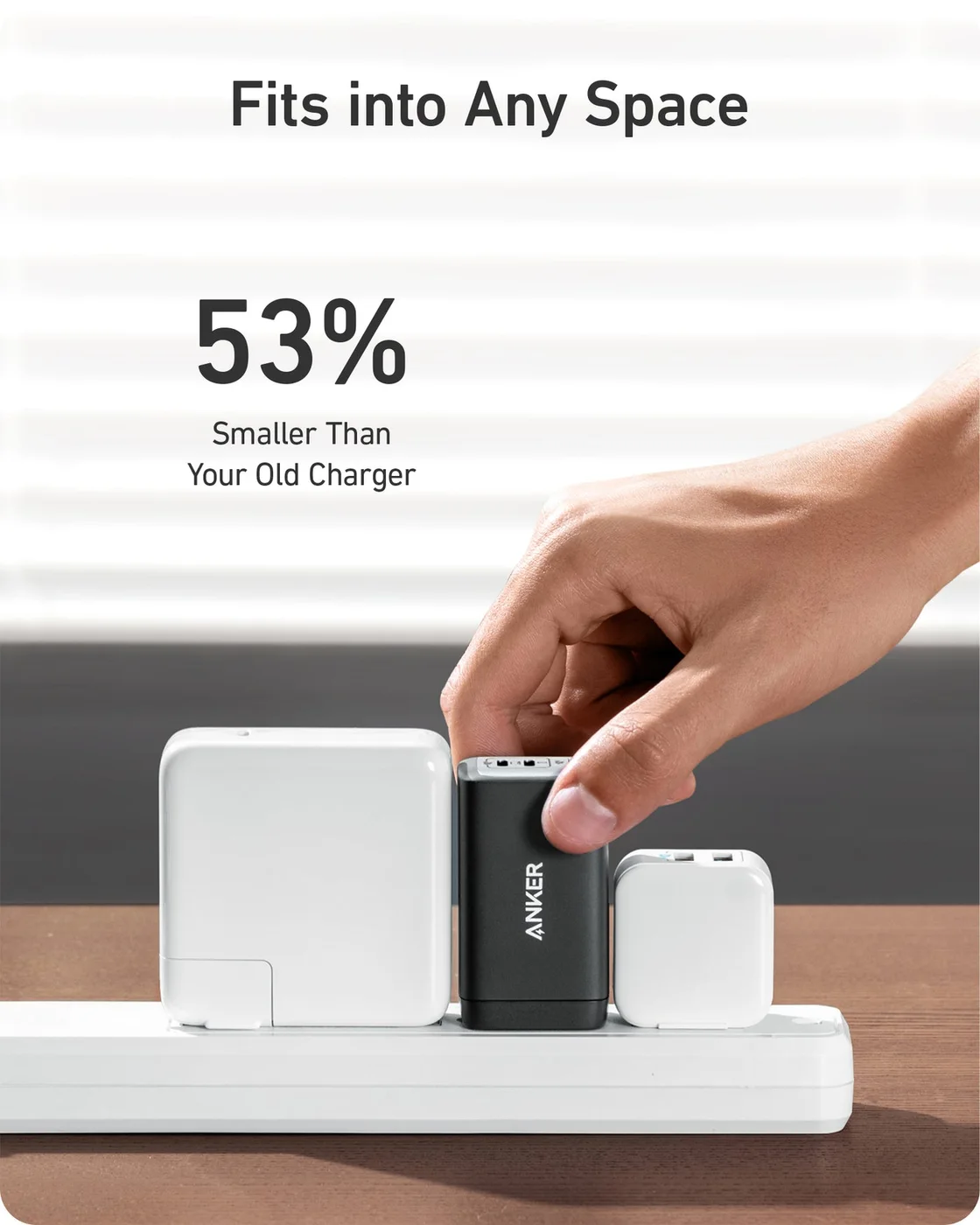A plug-strip scene illustrates the charger's footprint; neighbouring outlets and adapters may differ.