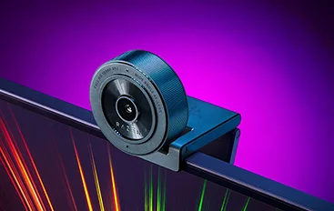 Kiyo X on a monitor edge demonstrates the flexible mounting angle; check your own screen clearance.