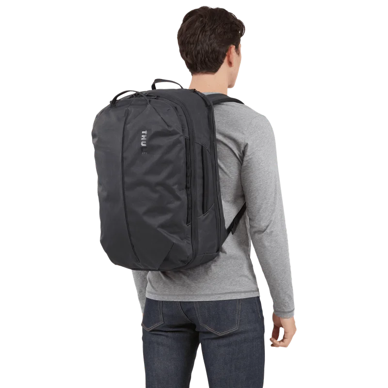 Manufacturer model shows the backpack's scale when worn; individual fit varies.