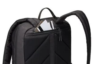 Small rear stash pocket shown with example items.