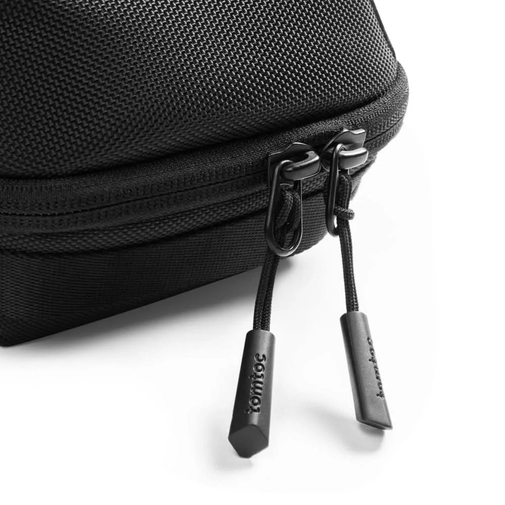Close view of the exterior fabric and zipper pulls.