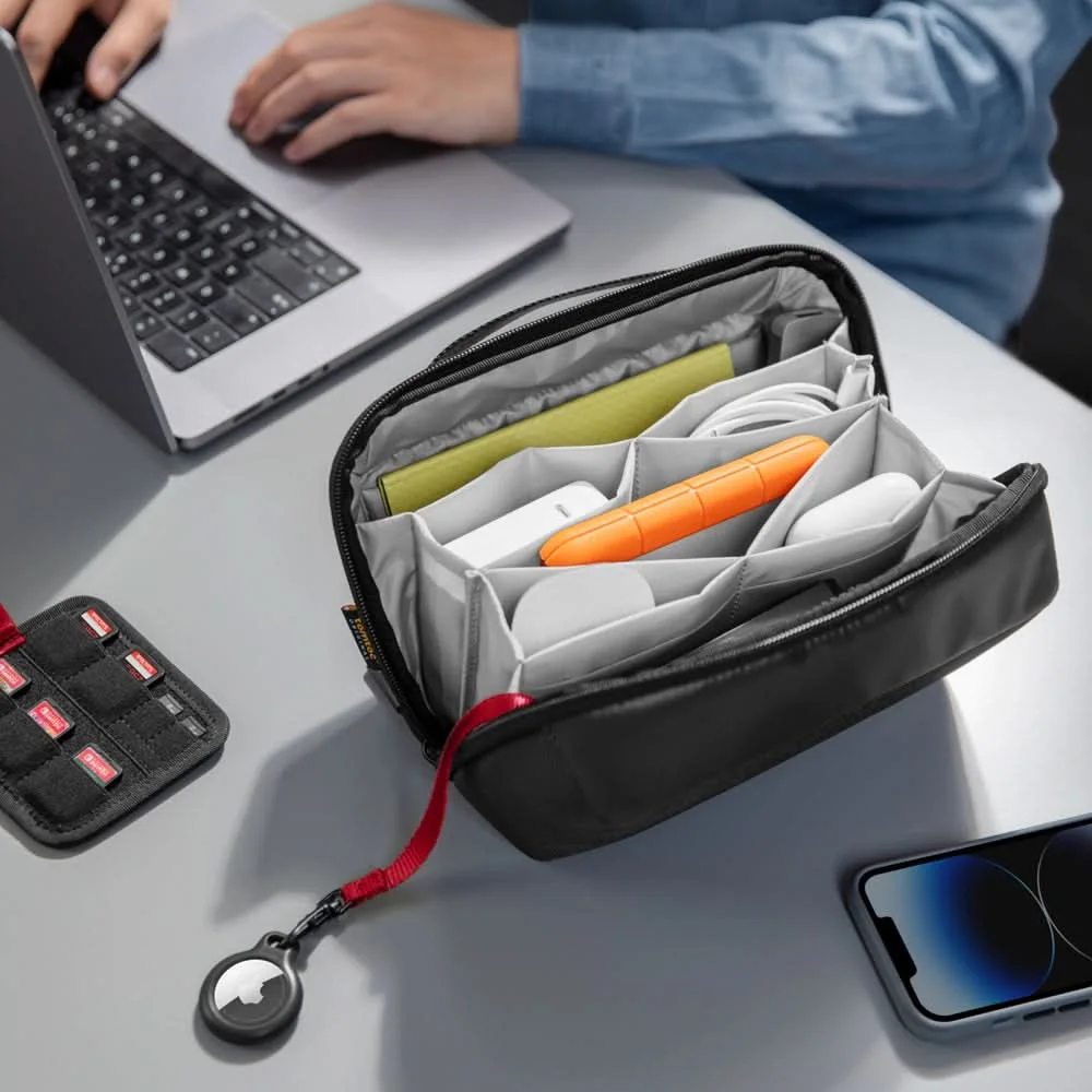 Open organizer beside a laptop illustrates a temporary workstation.