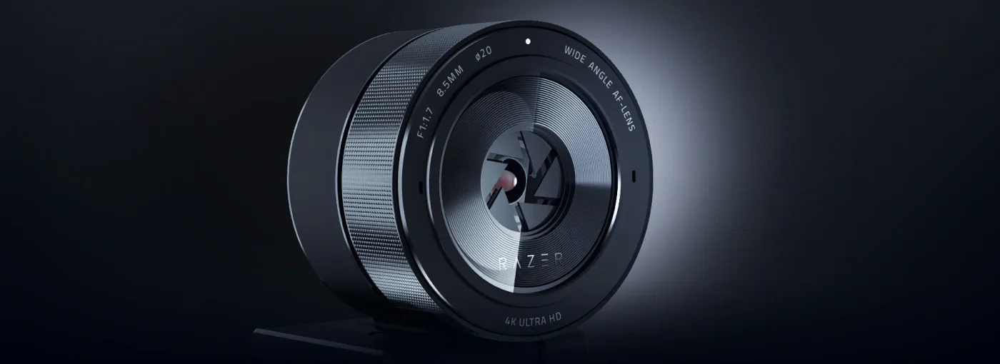 Partially rotated shutter position, illustrating the physical lens-cover mechanism.