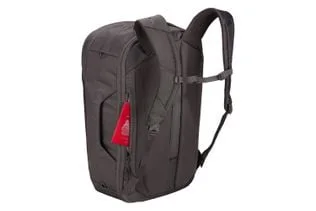 Rear pocket shown with a passport for scale and organization illustration.
