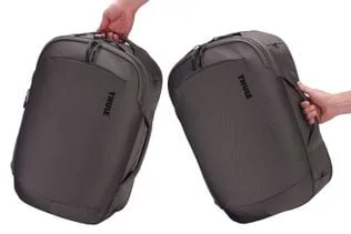 Grab handles demonstrated for lifting and rearranging the bag.