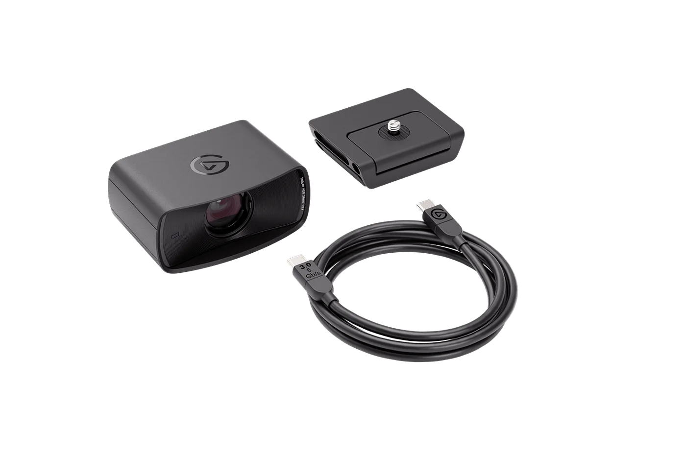 Manufacturer box-contents photograph with camera, monitor mount and USB cable.