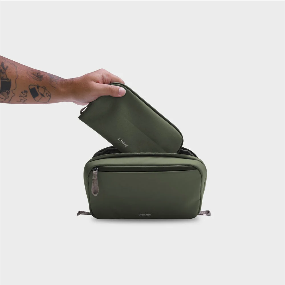 Removable slim pouch lifted from the main organizer.