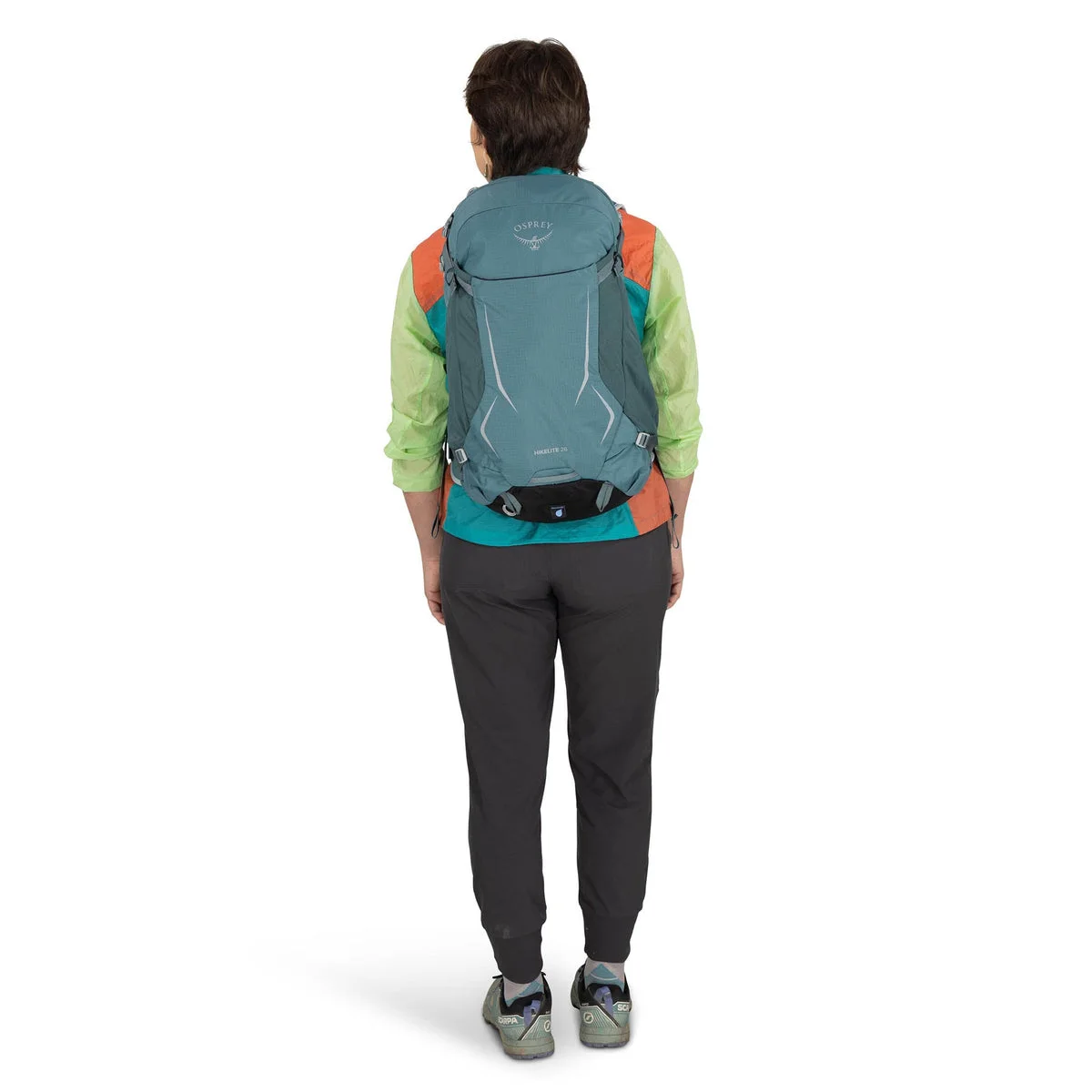 Blue same-model pack worn by a second model, rear view.