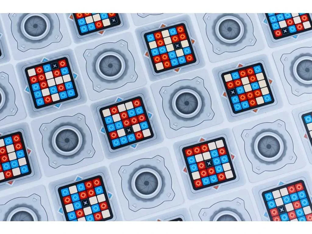 Key-card grids encode the hidden card identities visible to the spymasters.