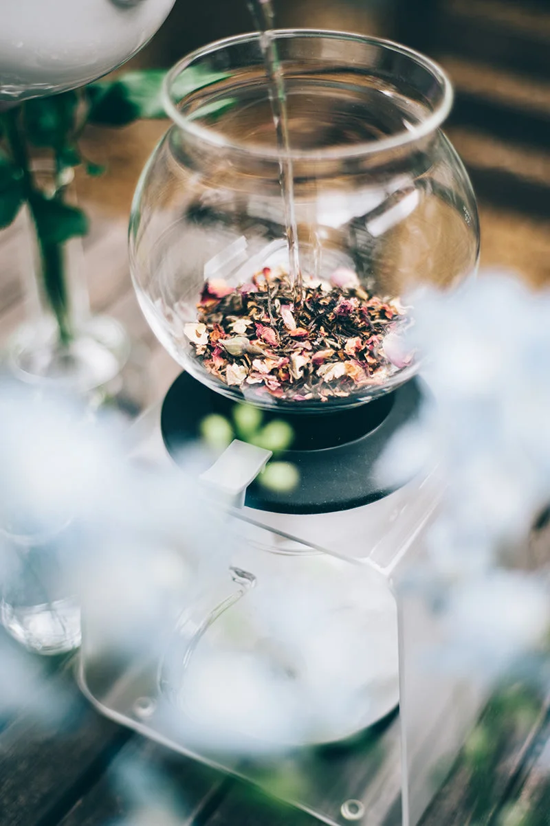 Tea leaves in the glass chamber before serving.