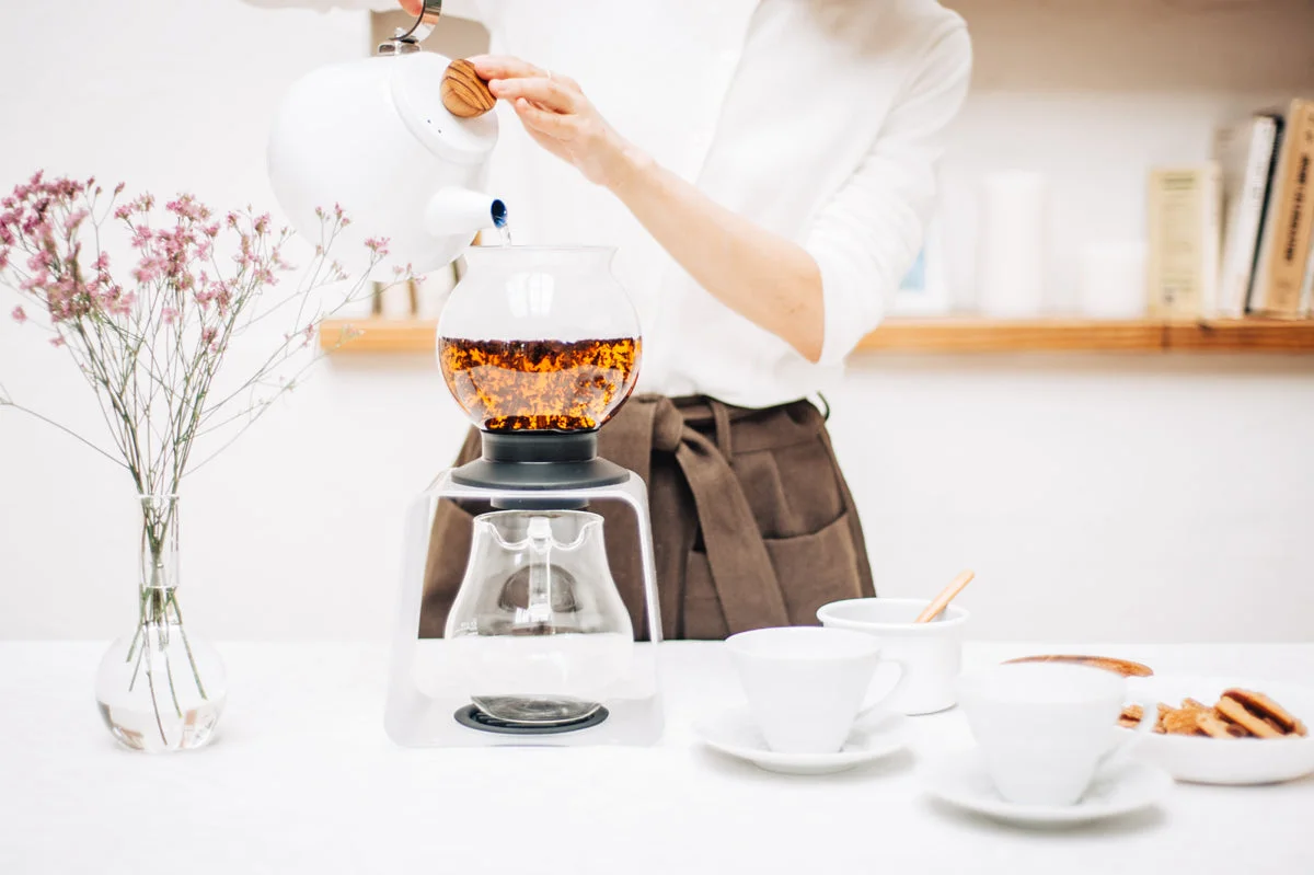 Full-set tea preparation on a worktop.