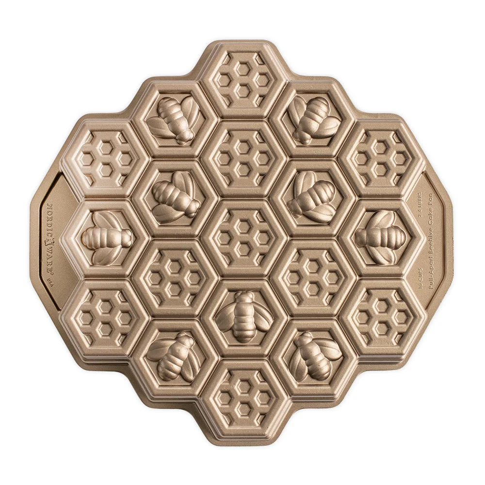 Selected Toffee Honeycomb pan with bee motifs and connected hexagonal sections.